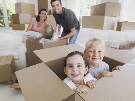 Packing boxes and furniture prepared for an Acton house move