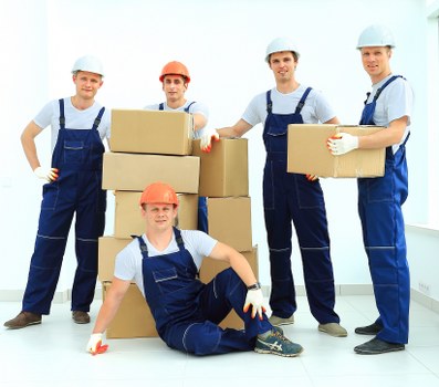 Prepared boxes and furniture for a removals van move in Acton