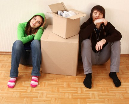 Loading boxes and furniture into a removal van for an Acton move