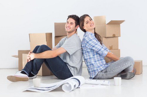 Local moving team handling boxes in Acton