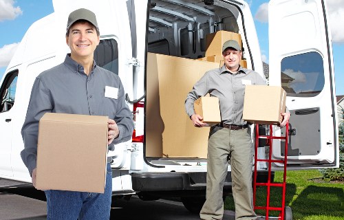 Careful loading of household items during an Acton removal