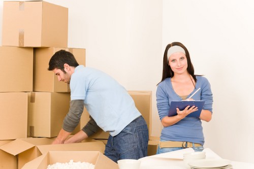 Packing and loading items for a house move in Acton
