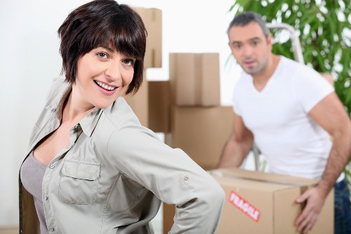 Careful loading of household items for removals in Acton