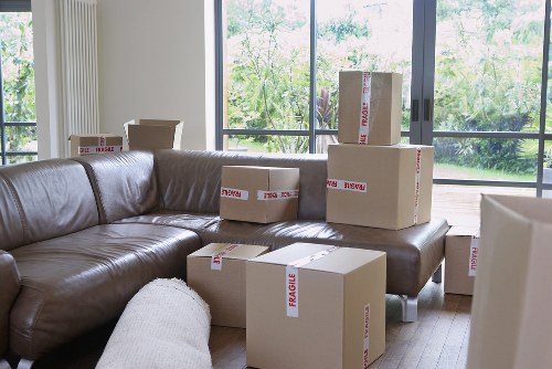 Local removals team handling bulky items in Acton